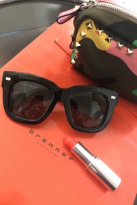 traveling-sunglasses-lipstick-beautybag-cultureandcream-blogpost